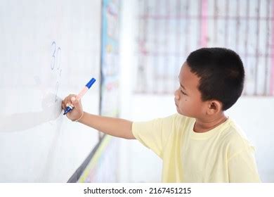 Asian Kid Doing Multiplication Math On Stock Photo 2167451215 | Shutterstock