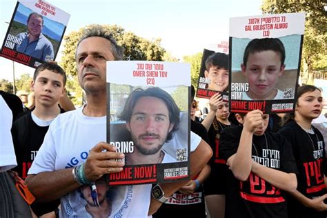 In photos: Families of Israeli hostages protest outside parliament ...