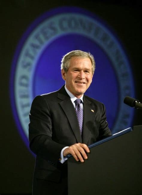 President George W. Bush reacts during his introduction at the United ...