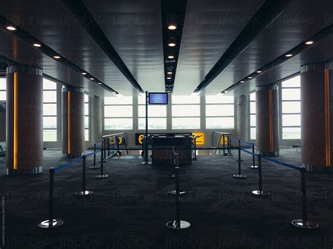 "Airport Boarding Gate" by Stocksy Contributor "Ohlamour Studio" - Stocksy