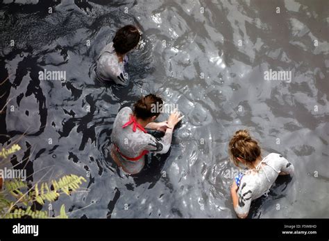 Young women taking mud bath at Sulphur Springs near the town of Stock Photo: 89680681 - Alamy