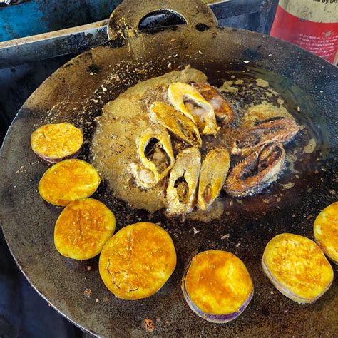 Ilish Fry - Fresh Ilish Fish on a Big Fry Pan Getting Cooked on a Hotel ...