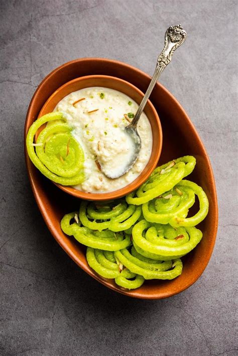 Rabdi Jalebi - Green jilebi or imarati with Rabri made from condensing milk, Indian dessert ...