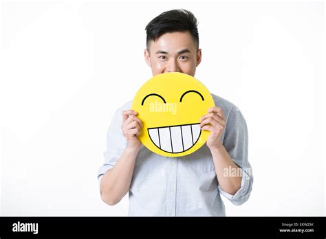 Smiling cartoon emoji emoticon smiley hi-res stock photography and ...