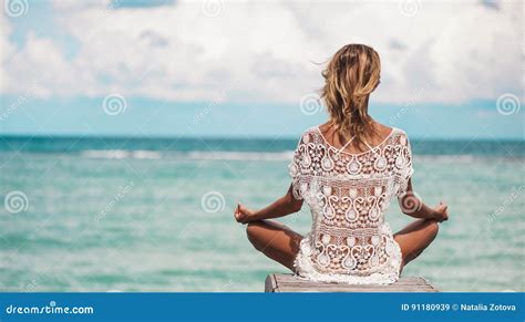 Woman Meditation in a Yoga Pose at the Beach Stock Image - Image of enlightenment, bali: 91180939