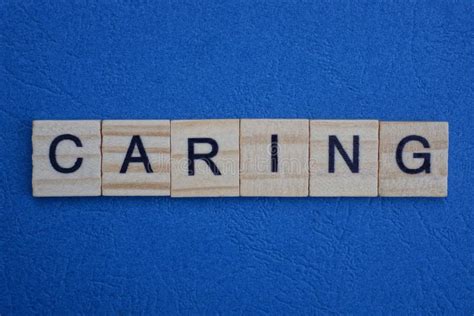 Gray Word Caring from Small Wooden Letters Stock Photo - Image of block, closeup: 168473916