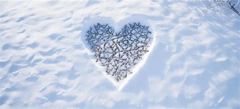 Premium AI Image | Create a heart shape in the snow by either walking ...