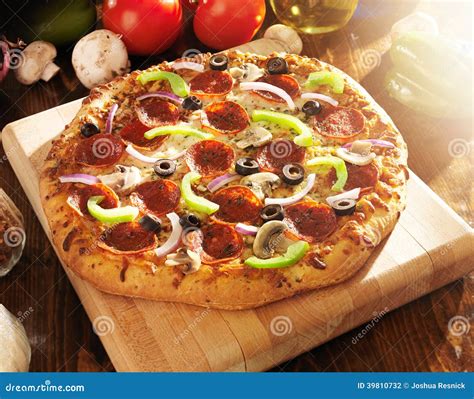 Supreme Italian Pizza with Pepperoni and Toppings Stock Photo - Image of dinner, italian: 39810732