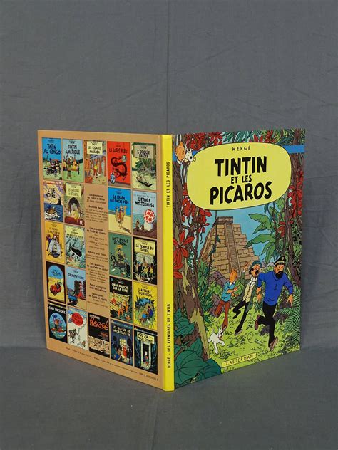 Tintin et les Picaros en édition originale de 1976 ( 24 titres au catalogue ) en très bel état ...