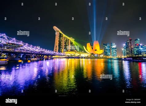 Singapore city skyline at night Stock Photo - Alamy