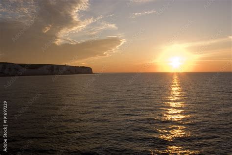 White cliffs of Dover sunrise from a cross channel ferry Stock Photo | Adobe Stock