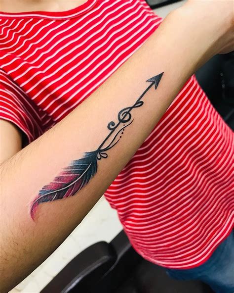 #feather #arrow #music #tattoo #ink #tattooideas #feathertattoos #musictattoo #arrowtattoo #wr ...