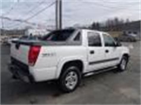 Black 2005 Chevrolet Avalanche Z71 4x4 Exterior Photo #62726338 | GTCarLot.com