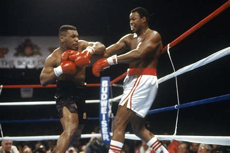 Iron Mike Tyson hands Larry Holmes his first knock out loss of his ...