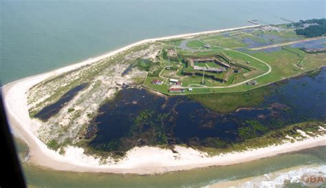 an aerial view of a small island in the ocean