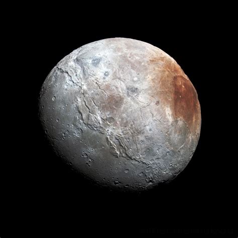 A new explanation for the reddish north pole of Pluto's moon Charon