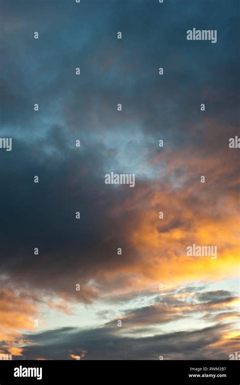 sunset with colorful stratocumulus clouds Stock Photo - Alamy