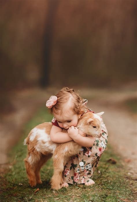 Adorable Children With Baby Animal Photos Showcase Sweet Bonds