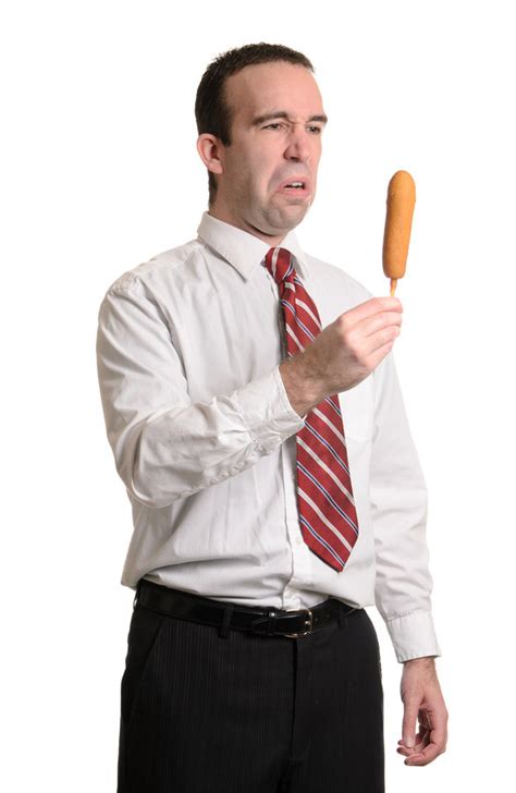 Man being spiteful at a corndog | Stock Photography | Know Your Meme