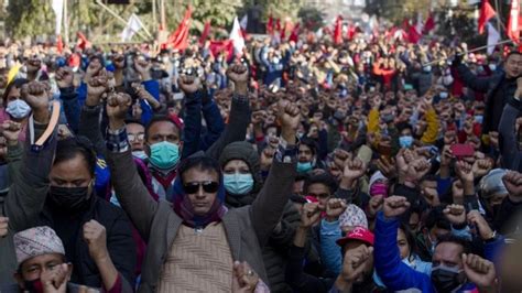 Nepal protests: Thousands march against move to dissolve parliament ...