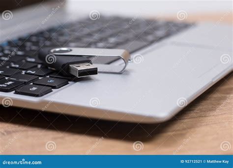 USB Memory Stick or Flash Drive on a Laptop Stock Image - Image of business, desk: 92712521