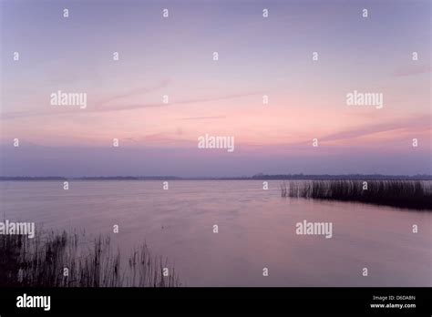 landscape with pink sky Stock Photo - Alamy