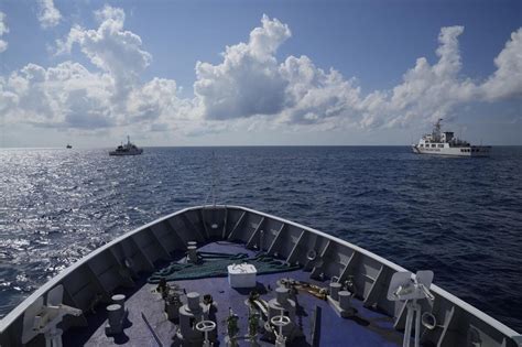 Tense face-off: Philippines confronts China over sea claims | AP News