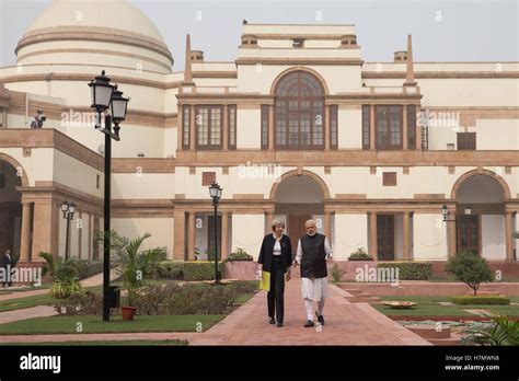 Prime Minister Theresa May and Indian Prime Minister Narendra Modi walk ...