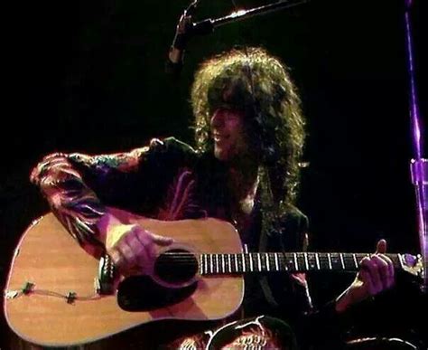 Jimmy Page playing acoustic guitar | Led zeppelin, Zeppelin, Going to ...