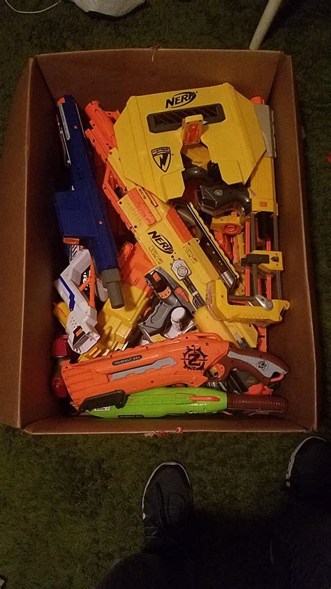 I just picked up this gigantic box of Nerf Guns, attachments, and magazines for just 18 dollars ...