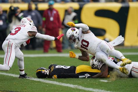 Kenny Pickett leaves Cardinals game with injury, seen with ankle boot ...