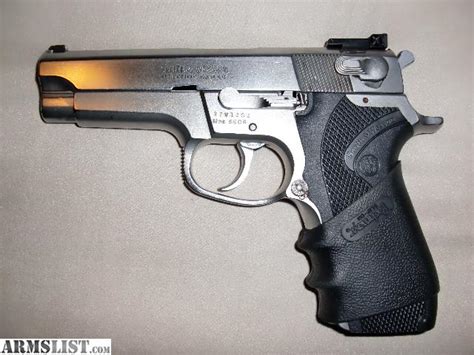 ARMSLIST - For Sale: S&W 5906 Stainless 9mm w/adjustable sights & 4 mags..PRICE REDUCTION