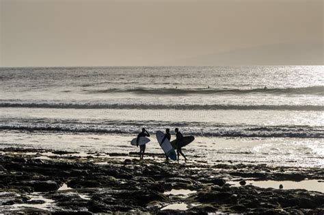 Surfers on the Playa De Las Americas Beach, Tenerife, Canary Islands ...