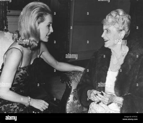 Marjorie Merriweather Post (right), socialite and heiress, seated ...