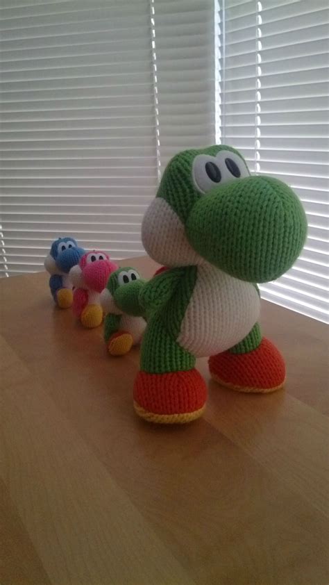 Mega Yarn Yoshi amiibo comes with a cut-out stand - Nintendo Everything