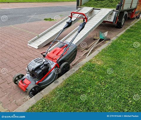 A Truck Loaded with Cut Grass. Ramps for Large Mowers Made Editorial Stock Image - Image of ...