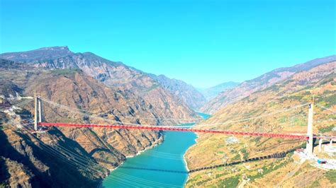 Construction of mega cross-gorge bridge in China makes breakthrough - CGTN