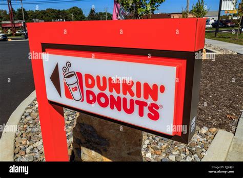 Dunkin donuts fast food restaurant exterior sign hi-res stock ...