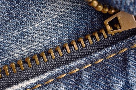 Premium Photo | Zipper fastener macro of denim jeans pant zipper