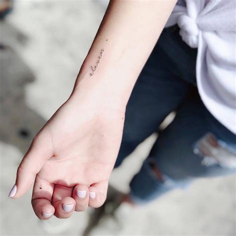 “Eleven” script tattoo on the inner wrist. Wrist Tattoos Quotes, Inner ...