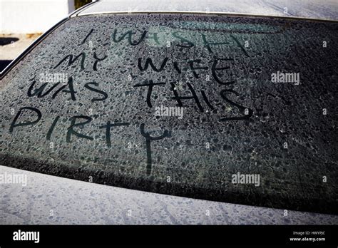 Dirty car window with inscription Stock Photo - Alamy