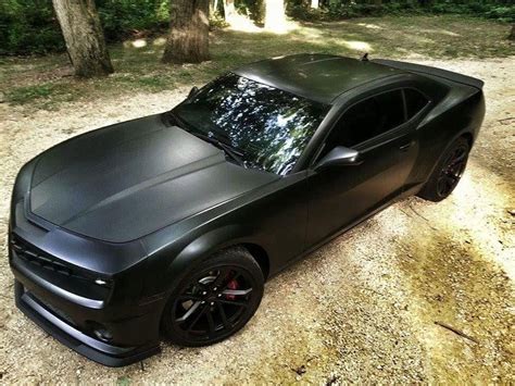 Totally mean looking Matte Black Camero 1LE wrapped by @autoskinsllc ...