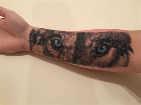 Wolf blue eyes forearm tattoo | Eye tattoo, Wolf tattoos, Forearm tattoos