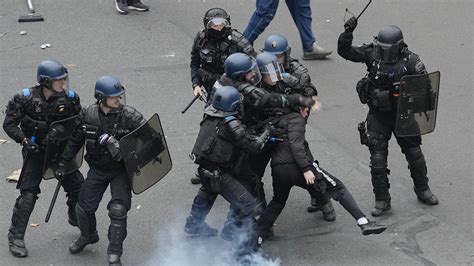 Macron under fire as French protests turn violent over increased ...