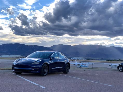 My blue Model 3 with Colorado Springs backdrop :) : r/TeslaPorn