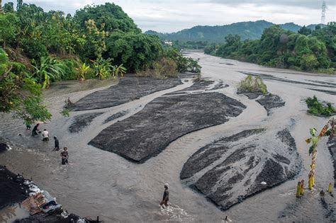 Lahar streams down the valley photo & image | asia, indonesia, southeast asia images at photo ...