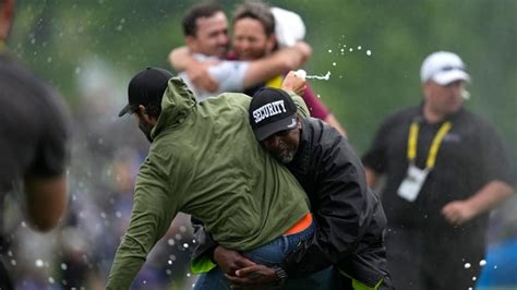 Canadian golfer flattened by security while spraying champagne in RBC Canadian Open celebration ...