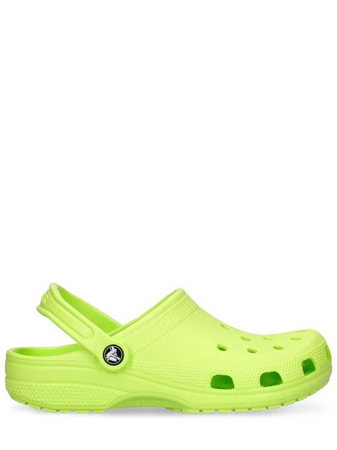 Popular designer lime green crocs | Editorialist