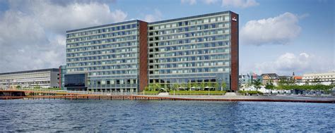 Copenhagen Marriott Hotel Dinamarca. Alojamiento de lujo junto al canal con amplio espacio para ...