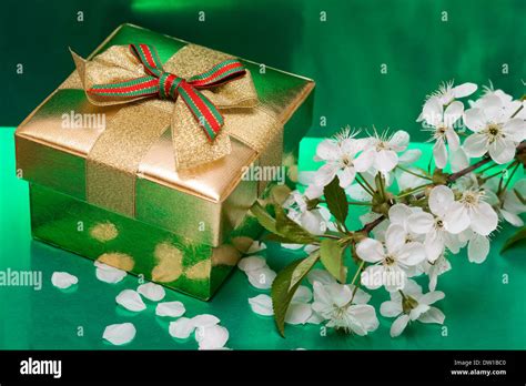 Gift box with white flowers Stock Photo - Alamy